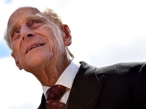 In this file photo taken on June 6, 2015, Britain's Prince Philip, Duke of Edinburgh arrives ahead of the racing on the second day of the Epsom Derby Festival in Surrey, southern England.