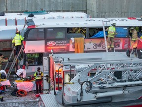 First responders attend to victims of a horrific rush hour bus crash at the Westboro Station near Tunney's Pasture, Jan. 11, 2019.