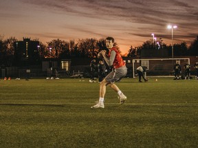 Quarterback George Reynolds, who's at the NFL Academy in England, has been recruited by the Ottawa Gee-Gees.