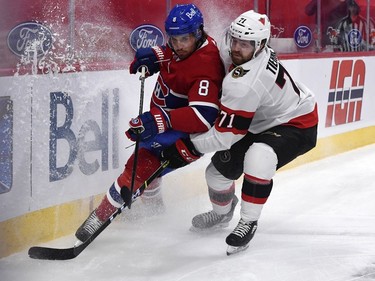 Canadiens defenceman Ben Chiarot and Senators forward Chris Tierney battle for the puck during the first period.