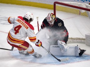 Ottawa Senators goalie Matt Murray makes a save on a shot by Calgary Flames defenceman Rasmus Andersson in the third period at the Canadian Tire Centre. Mandatory Credit: Marc DesRosiers-USA TODAY Sports ORG XMIT: IMAGN-44525