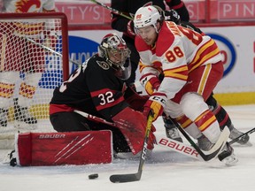 Calgary Flames left wing Andrew Mangiapane moves in for a shot against Ottawa Senators goalie Filip Gustavsson in the first period at the Canadian Tire Centre on Monday.
