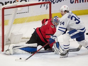 Toronto Maple Leafs center Auton Matthews skates with the puck in front of Ottawa Senators goalie Anton Forsberg in overtime at the Canadian Tire Centre on Thursday.