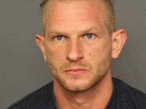Michael Close is accused of shooting dead a woman and injuring her boyfriend while the couple were walking their dog last June in Denver.