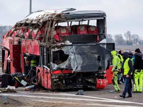Emergency personnel work at a site of a Ukrainian bus crash on the side of A4 highway from Jaroslaw to Korczowa, near Koszyce, Poland March 6, 2021.