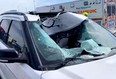 The smashed windshield of an SUV after being struck by an oncoming tire on the 401 near Renforth on Tuesday
