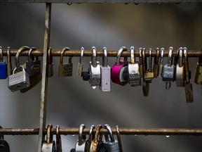 Water drops hang onto the locks clung to the Corktown Footbridge.