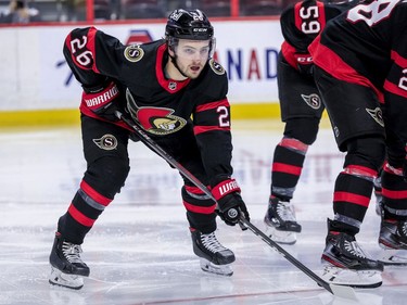 Ottawa Senators defenceman Erik Brannstrom lined up for a face-off against the Winnipeg Jets during second period NHL action at the Canadian Tire Centre.