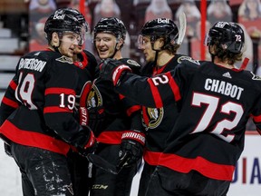 Ottawa Senators centre Josh Norris (9) is congratulated on his goal against the Vancouver Canucks on April 26, 2021.