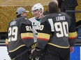 Patrick Marleau of the San Jose Sharks talks with Marc-Andre Fleury and Robin Lehner of the Vegas Golden Knights after Marleau played in his 1,768th NHL game at T-Mobile Arena on April 19, 2021 in Las Vegas.