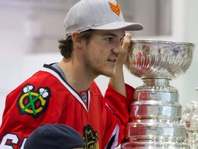 Andrew Shaw poses with the Stanley Cup in 2015.