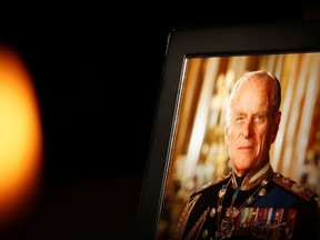 A picture of Britain's Prince Philip rests on a memorial at Sheffield cathedral, in Sheffield, Britain, April 13, 2021.