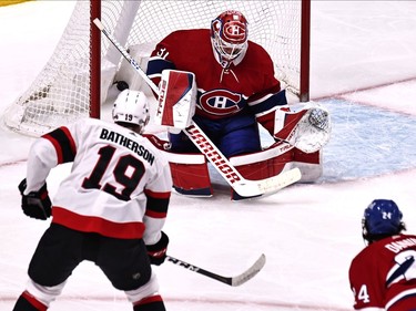 Ottawa Senators right wing Drake Batherson (19) scores a goal against Montreal Canadiens goaltender Carey Price (31) during the second period at Bell Centre.