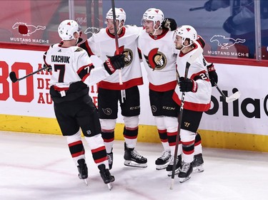 Ottawa Senators right wing Drake Batherson (19) celebrates his goal against Montreal Canadiens with teammates during the second period at Bell Centre.