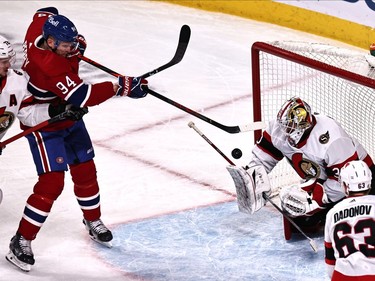 Montreal Canadiens right wing Corey Perry (94) shoots the puck against Ottawa Senators goaltender Matt Murray (30) during the second period at Bell Centre.