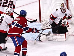 Senators goaltender Matt Murray (30) makes a save against Canadiens right-winger Josh Anderson (17) as defenceman Artem Zub (2) defends during the second period at the Bell Centre on Saturday.