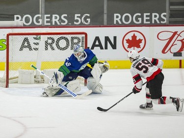 Apr 24, 2021; Vancouver, British Columbia, CAN; Vancouver Canucks goalie Braden Holtby (49) makes a save on a penalty shot attempt taken by Ottawa Senators forward Alex Formenton (59) in the second period at Rogers Arena. Canucks won 4-2.  Mandatory Credit: Bob Frid-USA TODAY Sports ORG XMIT: IMAGN-445658
