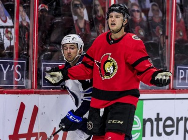 Ottawa Senators centre Josh Norris (9) appeals to the referee in vain after being assessed a minor penalty for tripping Winnipeg Jets defenceman Neal Pionk (4) during the third period.