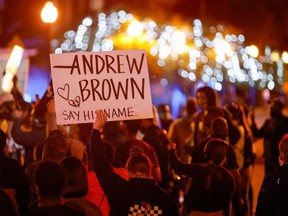 Protesters march in the evening after family members were shown body camera footage of a deputy sheriff shooting and killing Black suspect Andrew Brown Jr. last week, in Elizabeth City, North Carolina, U.S. April 26, 2021.