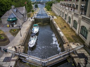 File photo/ Boats make their way through the Rideau Canal Locks at the Ottawa River.