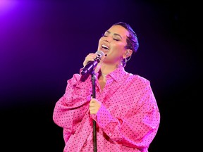 Demi Lovato performs during the OBB Premiere Event for YouTube Originals Docuseries "Demi Lovato: Dancing With The Devil" at The Beverly Hilton on March 22, 2021 in Beverly Hills, California.