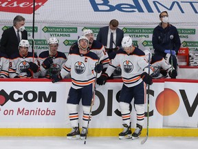 Connor McDavid (left) and the Edmonton Oilers were eliminated from the playoffs in four games by the Winnipeg Jets.