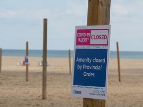 Beach volleyball courts are off limits at Woodbine Beach in Toronto due to the provincial stay-at-home order on Sunday, April 25, 2021.