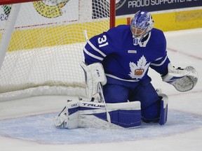 Goalie Frederik Andersen makes a toe save during his conditioning stint with the AHL's Marlies in Toronto on Thursday, May 6, 2021.