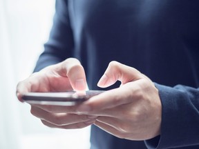 Closeup man hands typing write message on smart phone, Chat with friends, social network.