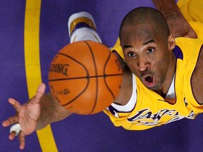 Los Angeles Lakers star Kobe Bryant jumps for a rebound against the Denver Nuggets during in Los Angeles May 21, 2009.