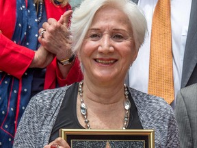 In this file photo taken on May 24, 2013, actress Olympia Dukakis is honoured with the 2,498th Star on the Hollywood Walk of Fame in Hollywood, Calif.