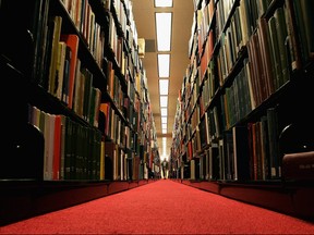 A man browses through books at the Cecil H. Green on the Stanford University Campus Dec. 17, 2004 in Stanford, Calif.