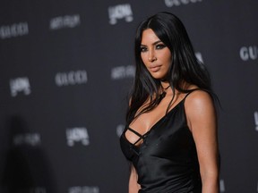 In this file photo taken on November 03, 2018 Kim Kardashian-West arrives for the 2018 LACMA Art+Film Gala at the Los Angeles County Museum of Art in Los Angeles, California.