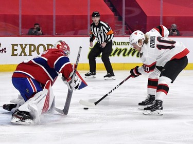 Montreal Canadiens goalie Cayden Primeau (30) stops Ottawa Senators forward Ryan Dzingel (10) during the first period at the Bell Centre.