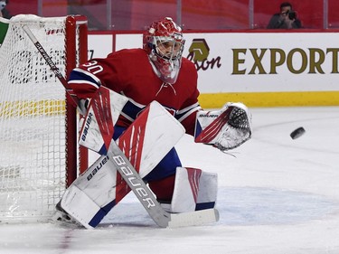 Montreal Canadiens goalie Cayden Primeau (30) makes a save during the first period of the game against the Ottawa Senators at the Bell Centre.