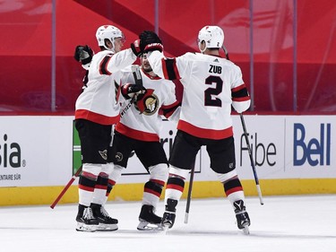 Ottawa Senators forward Tim Stutzle (18) reacts with teammates including defenceman Artem Zub (2) after scoring a goal against the Montreal Canadiens during the second period at the Bell Centre.
