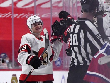 Ottawa Senators forward Tim Stutzle (18) reacts with teammates after scoring a goal against the Montreal Canadiens during the second period at the Bell Centre.