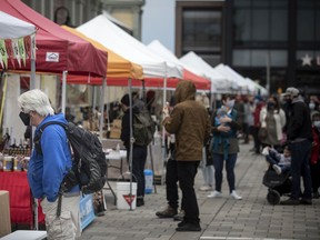 Shoppers are seen at The Ottawa Farmers' Market on May 2.