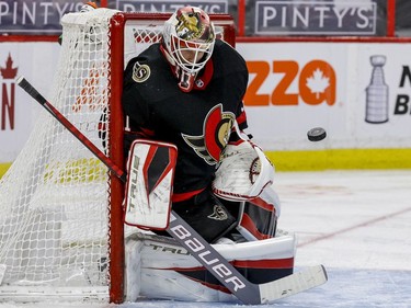 Ottawa Senators goaltender Anton Forsberg makes a save against the Montreal Canadiens during second-period action at the Canadian Tire Centre on Wednesday, May 5, 2021.