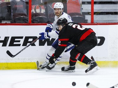 Toronto Maple Leafs left wing Pierre Engvall (47) gets a pass past Ottawa Senators defenseman Artem Zub.