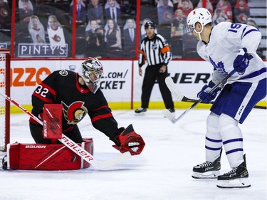 Ottawa Senators goaltender Filip Gustavsson (32) stops Toronto Maple Leafs centre Jason Spezza (19) during the second period.