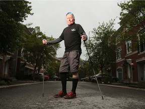 Michael Baine  in front of his house in Ottawa . Baine has stage four prostate cancer that has spread to his bones and hips.
