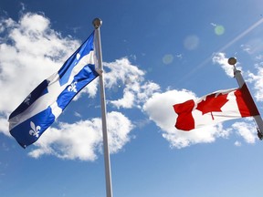 The Quebec and Canadian flags