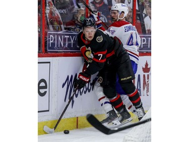 Ottawa Senators left wing Brady Tkachuk (7) wins the puck battle against Montreal Canadiens defenceman Joel Edmundson (44).