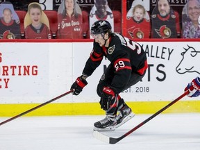 Ottawa Senators left wing Alex Formenton (59) pulls away from Montreal Canadiens defenceman Joel Edmundson.