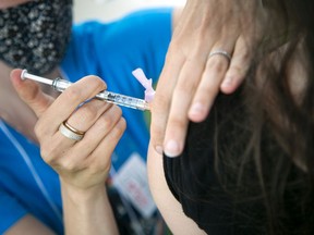 A file photo of a COVID-19 vaccination in Ottawa.
