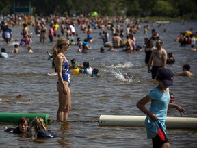Very large crowds were at Mooney's Bay Beach as Ottawa was hit with extreme heat Sunday, June 6, 2021. ASHLEY FRASER, POSTMEDIA
