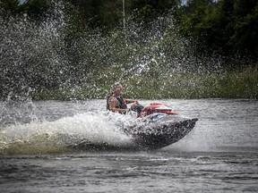 FILE: Boats and Sea Doo's were out on the Rideau River near Eccolands Park, Sunday, June 13, 2021.