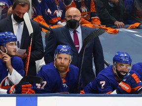 Head coach Barry Trotz of the New York Islanders looks on against the Tampa Bay Lightning during the third period in Game Three of the Stanley Cup Semifinals during the 2021 Stanley Cup Playoffs at Nassau Coliseum on June 17, 2021 in Uniondale, New York.