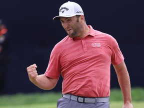Jon Rahm of Spain celebrates making a putt for birdie on the 18th green during the final round of the 2021 U.S. Open at Torrey Pines Golf Course (South Course) on June 20, 2021 in San Diego, California.